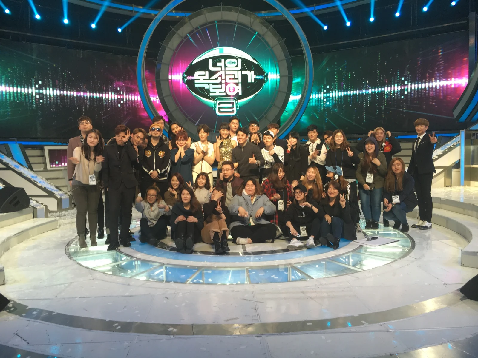 A group photograph on a television production set