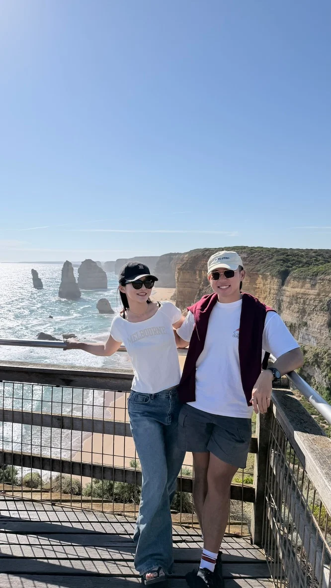 Two travelers at a coastal lookout
